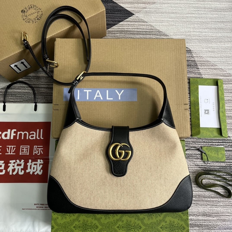 G*u*i top handle bags